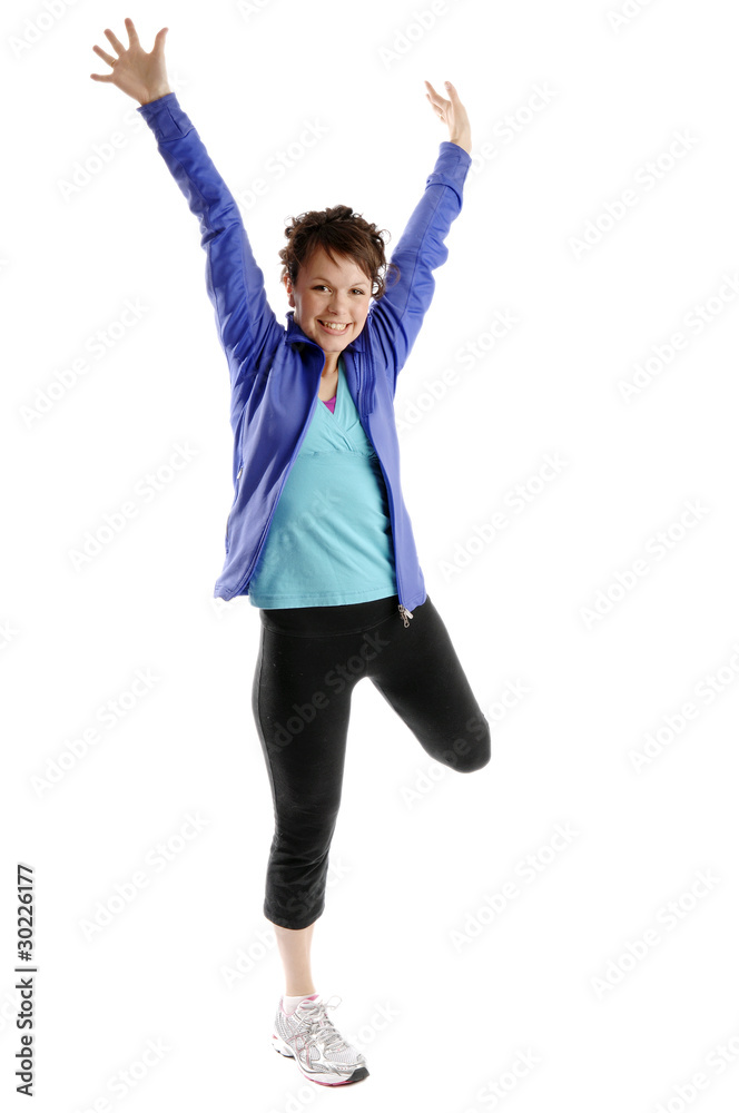 Young sporty woman exercises