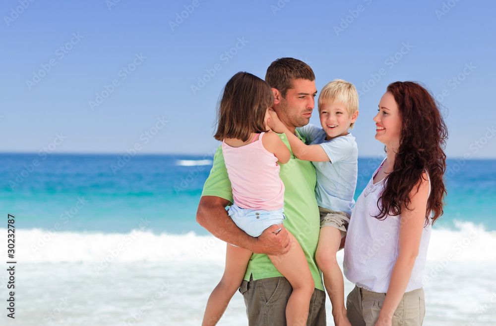 Happy children playing with their parents Happy children playing with their parents