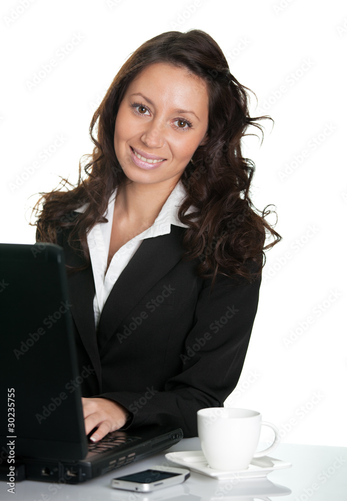 Beautiful business woman working on laptop Beautiful business woman working on laptop