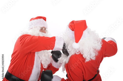 Two santa clausare boxing fight