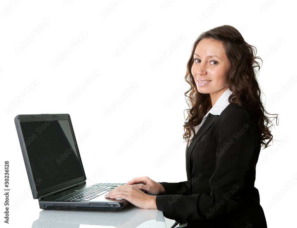 Beautiful business woman working on laptop Beautiful business woman working on laptop