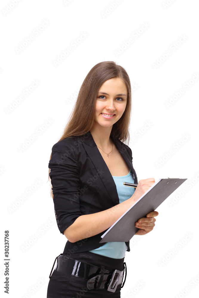 young happy female in blue shirt makes some notes in young happy female in blue shirt makes some notes in