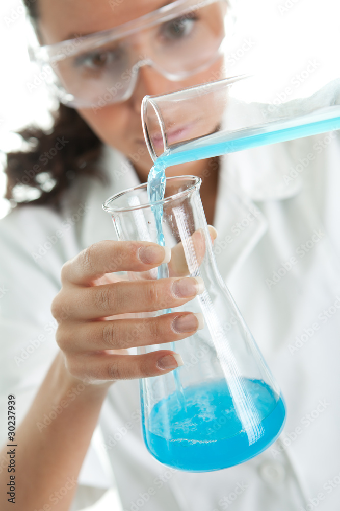 Woman involved in chemical research Woman involved in chemical research