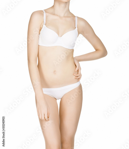 Beautiful slim female body in underwear