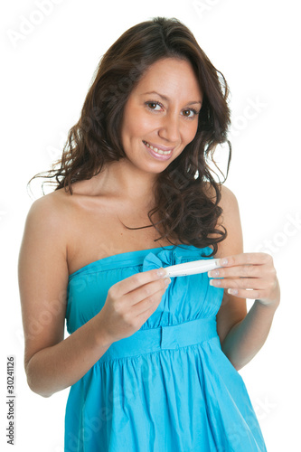 Cheerful woman with pregnancy test