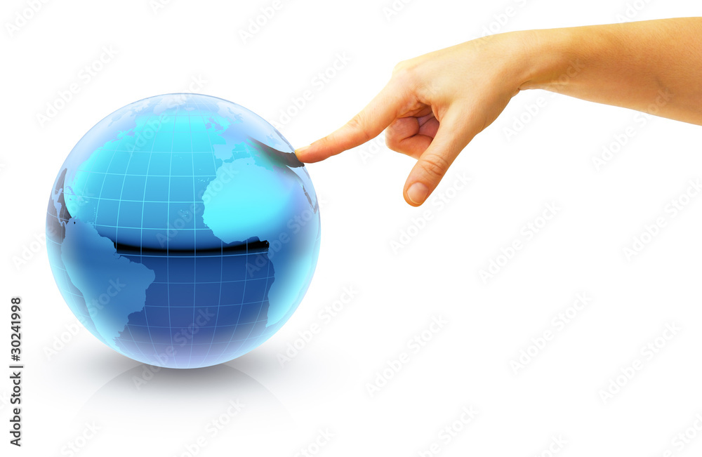 Hand pointing on a globe as holiday destination to Europe