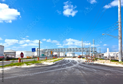 entrance of refinery with tanks © travelview