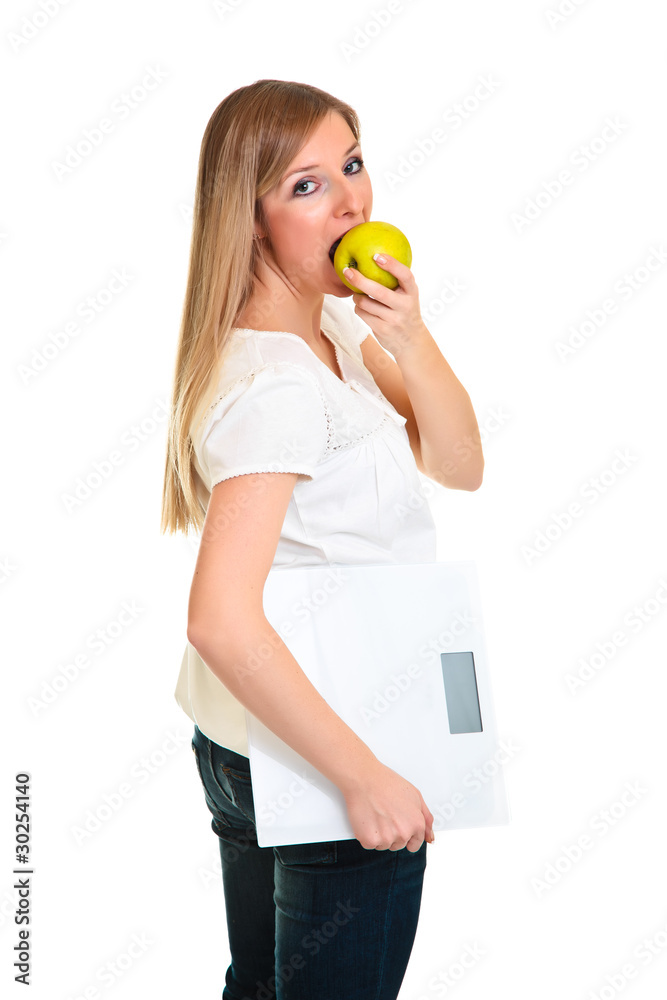 Woman with apple and scales isolated on white Woman with apple and scales isolated on white