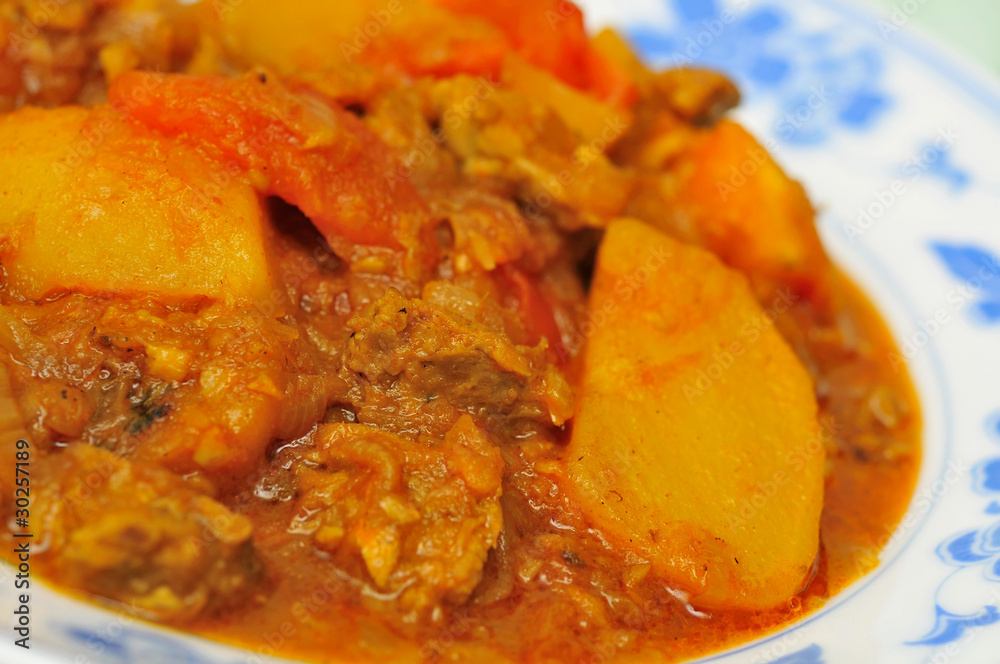 Macro of spicy curry dish Macro of spicy curry dish