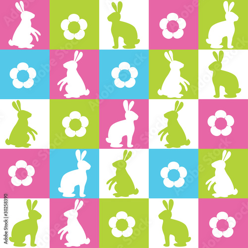 Seamless background with rabbits and flowers