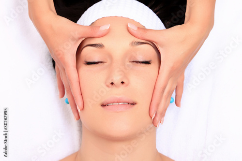 A young woman relaxing at a health spa