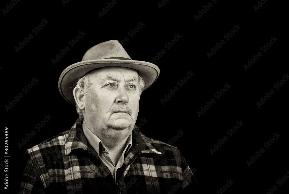 senior male retired wearing a hat on black senior male retired wearing a hat on black
