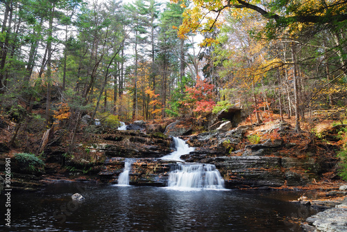 Autumn Waterfall in mountain photo