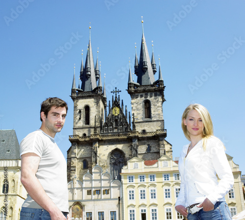 Photography couple in Prague, Tynsky church, Old Town Square, Czech Republic