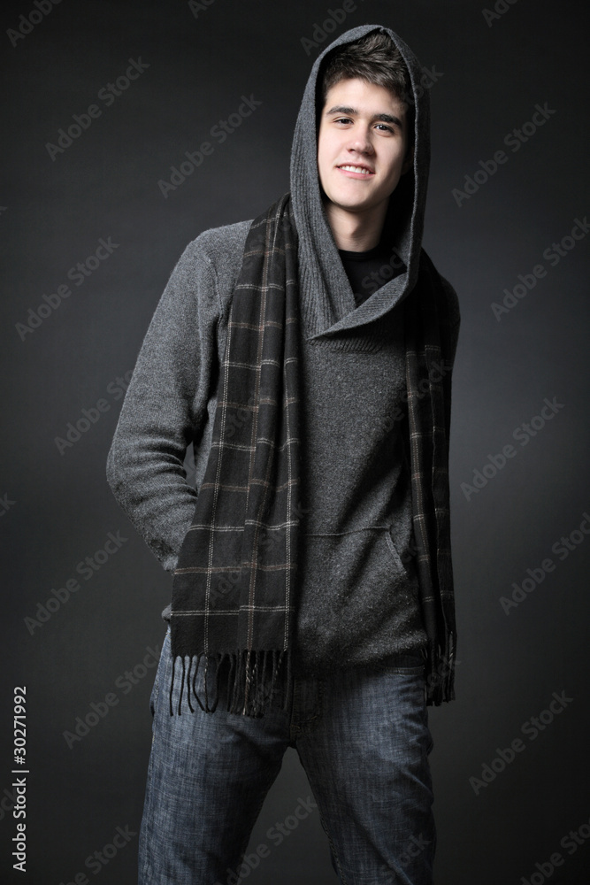 Young attractive happy man possing in studio. Young attractive happy man possing in studio.