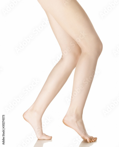 Slender and long beautiful female legs