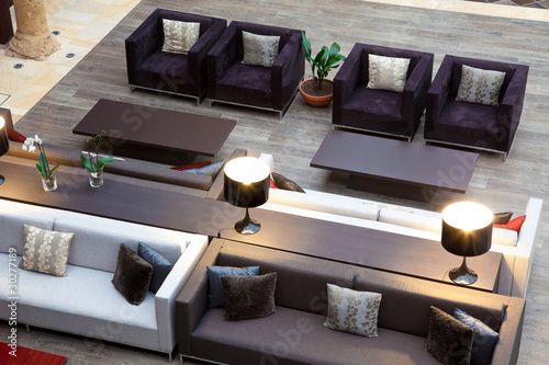 top view of a sofas area in an hotel lobby photo
