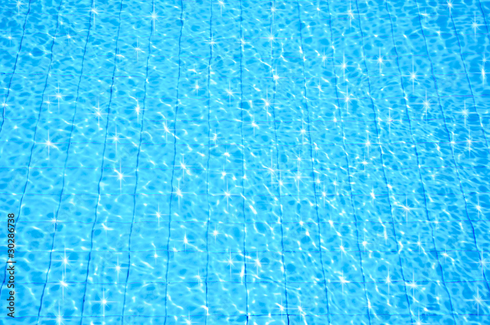 blue swimming pool with ripple water and reflection