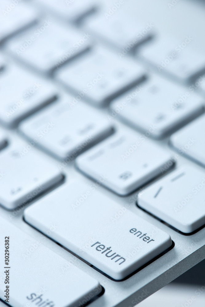 a close up from a computer keyboard with the key enter return a close up from a computer keyboard with the key enter return