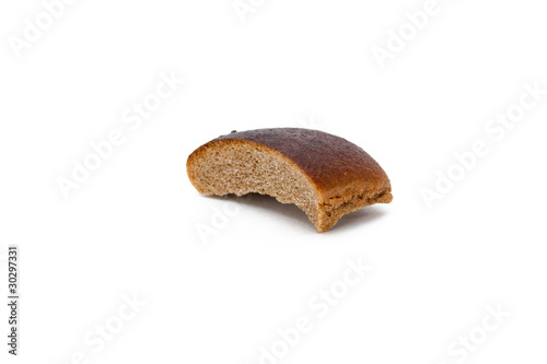 A piece of stale bread on a white background