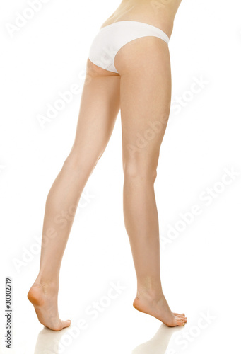 Slender and long beautiful female legs