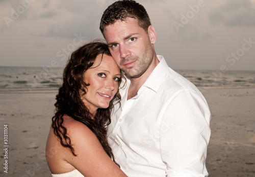 wedding couple on the beach © JonMilnes