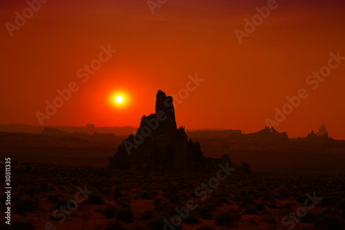 Rock formation silhouettes during sunset
