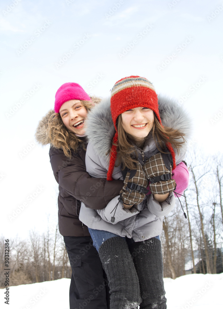 Obraz premium Teenager having fun in snow