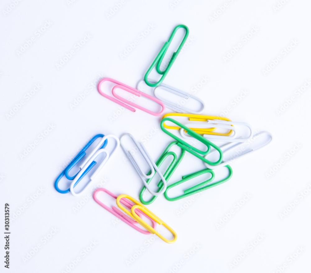 Isolated mixed colored paperclips on white background Isolated mixed colored paperclips on white background