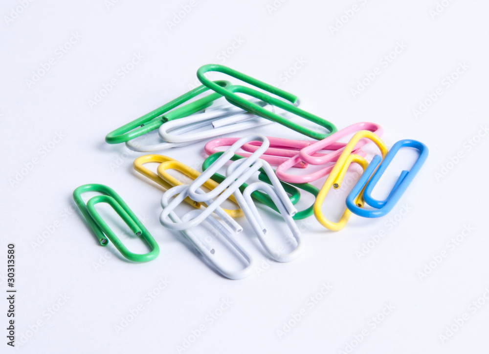 Isolated mixed colored paperclips on white background Isolated mixed colored paperclips on white background