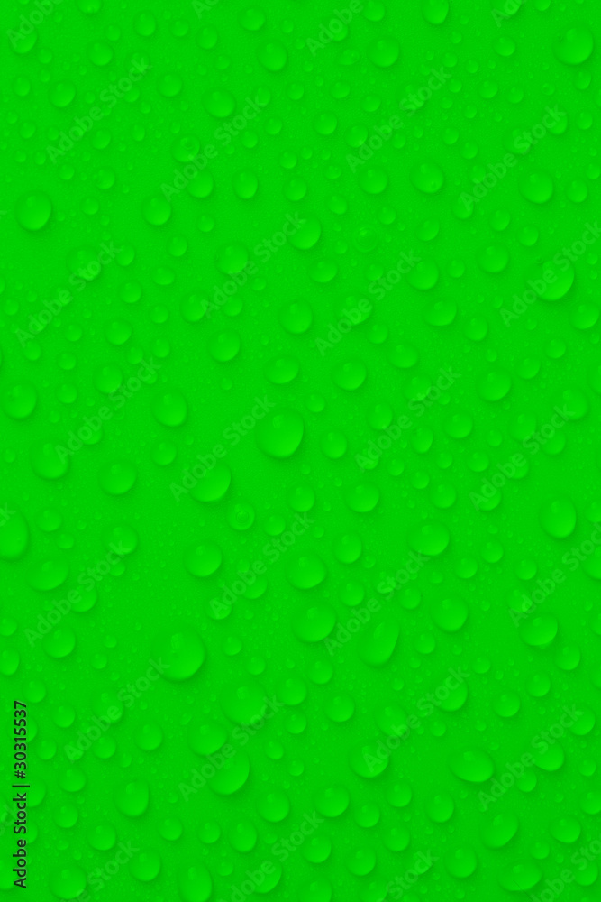 Water-drops on green background