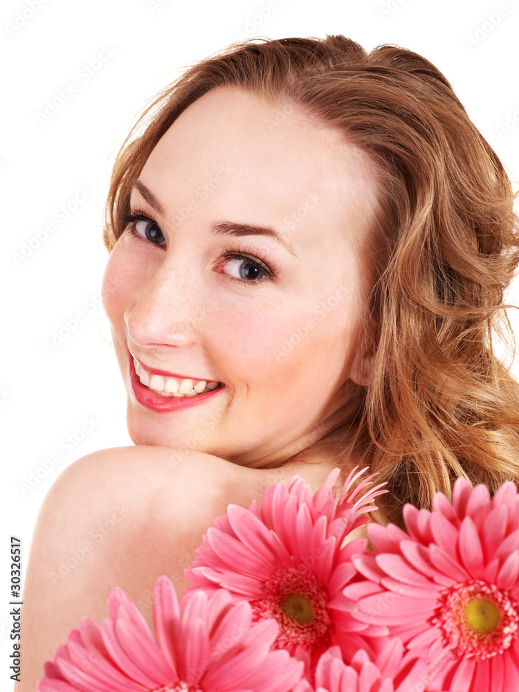 Happy young woman holding flowers.