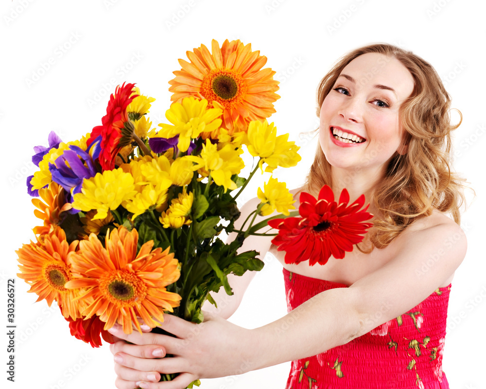 Young woman holding flowers.