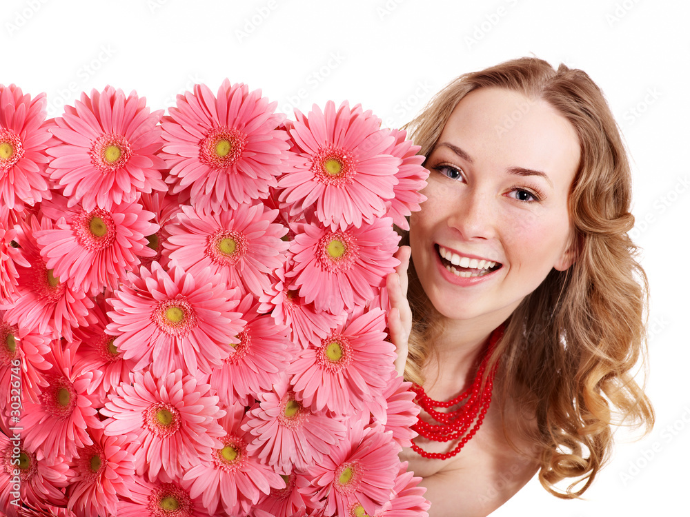 Young woman holding flowers. Young woman holding flowers.