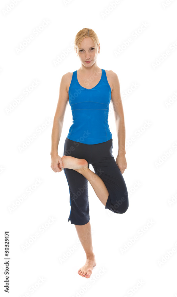 Practicing Yoga. Young woman