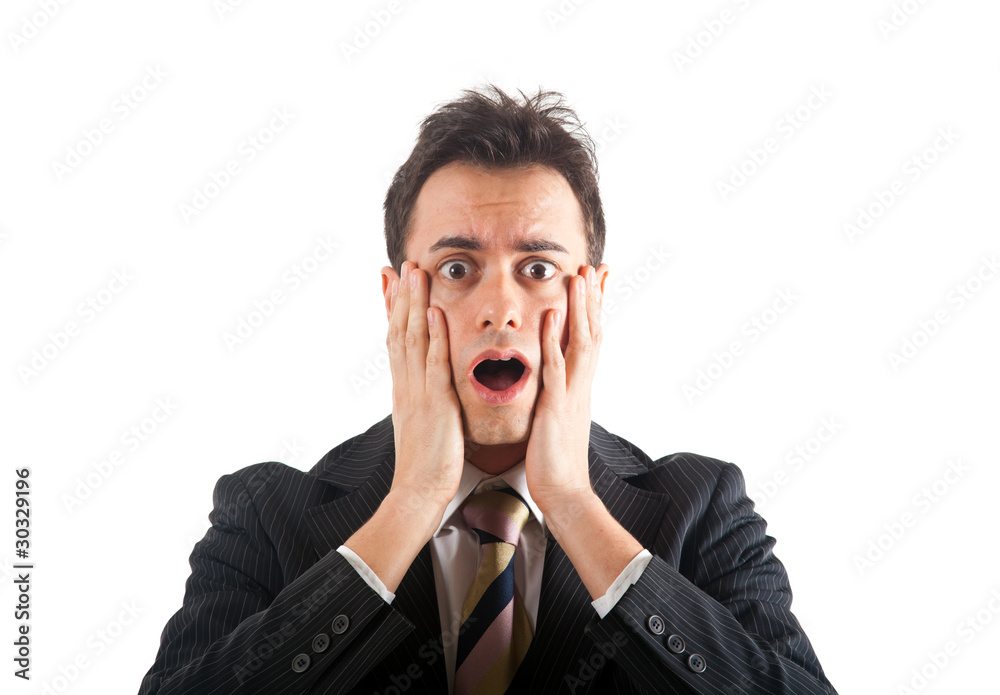 Young man with a shocked facial expression Young man with a shocked facial expression