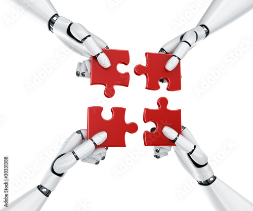 Robot hands with puzzle pieces