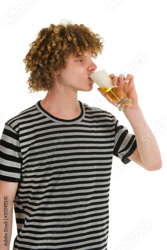 Young boy is drinking beer