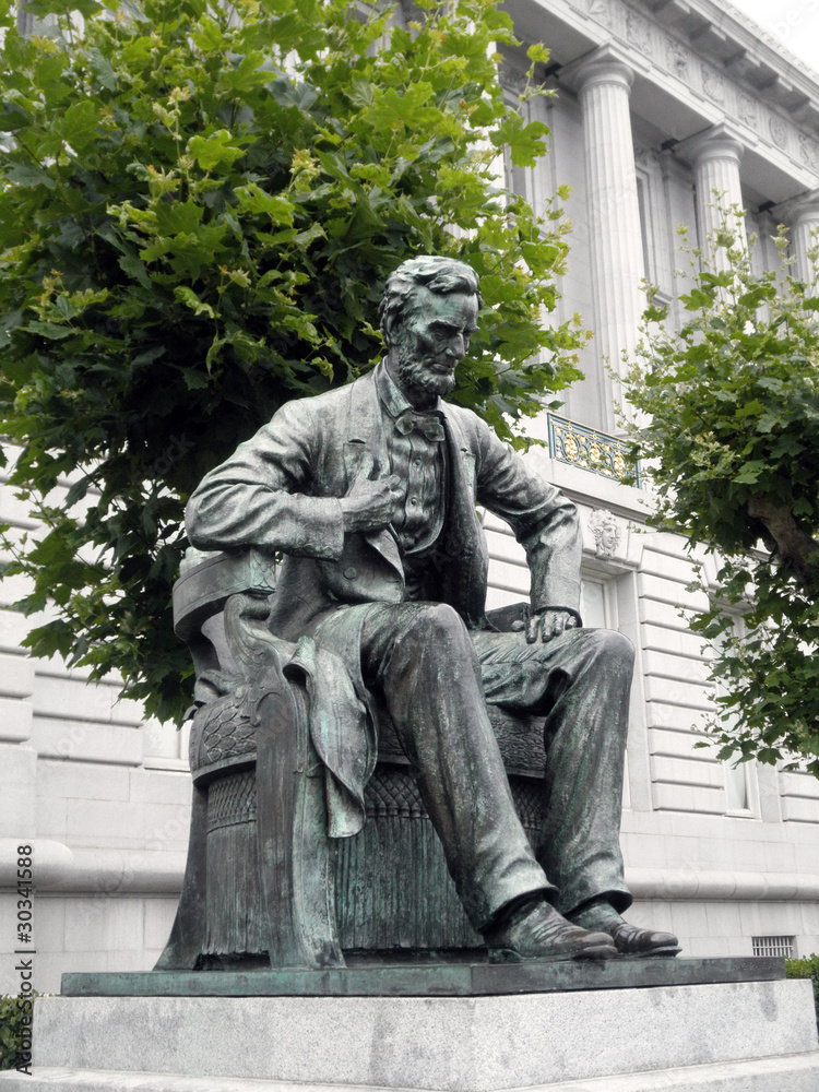 Side angle of Statue of Abe Lincoln sitting down in Front of Cit