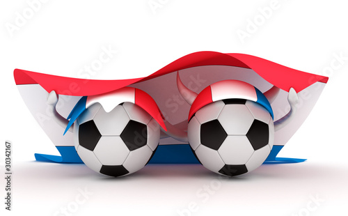 Two soccer balls hold Netherlands flag