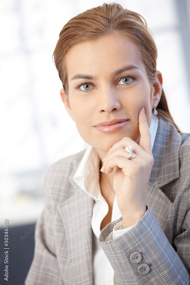 Portrait of attractive businesswoman smiling Portrait of attractive businesswoman smiling