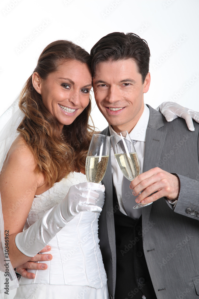 Bride and groom drinking champagne Bride and groom drinking champagne