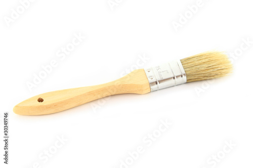Wood brush for painting on food.