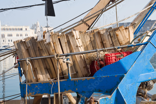 Wooden crates on a fishing trawler.