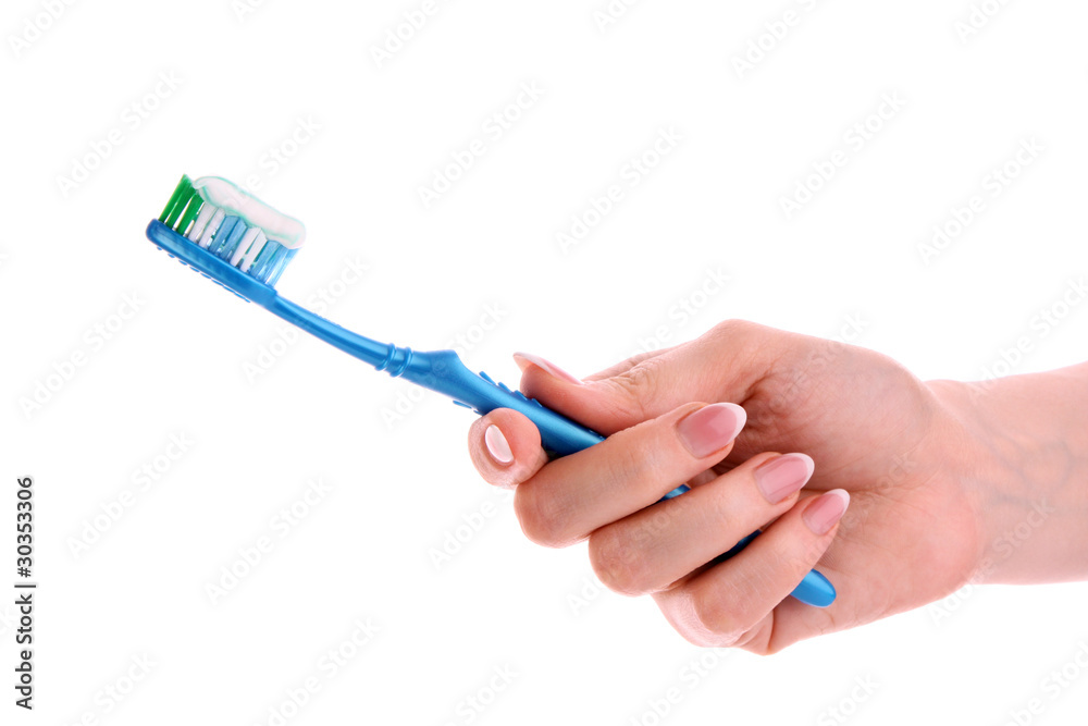 Tooth Paste on the blue Brush isolated with white background Tooth Paste on the blue Brush isolated with white background
