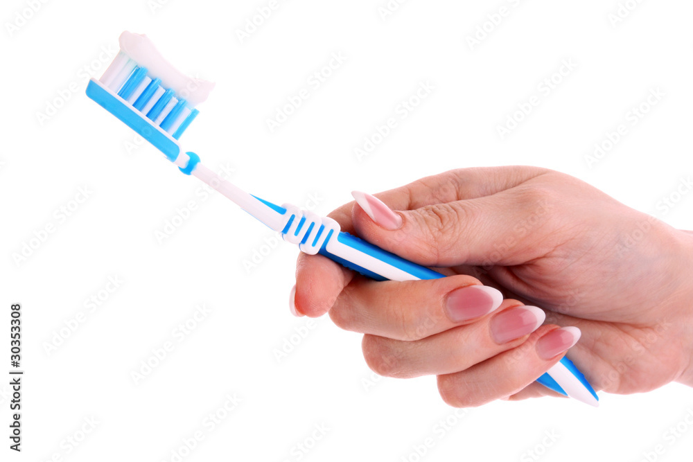 Tooth Paste on the blue Brush isolated with white background Tooth Paste on the blue Brush isolated with white background