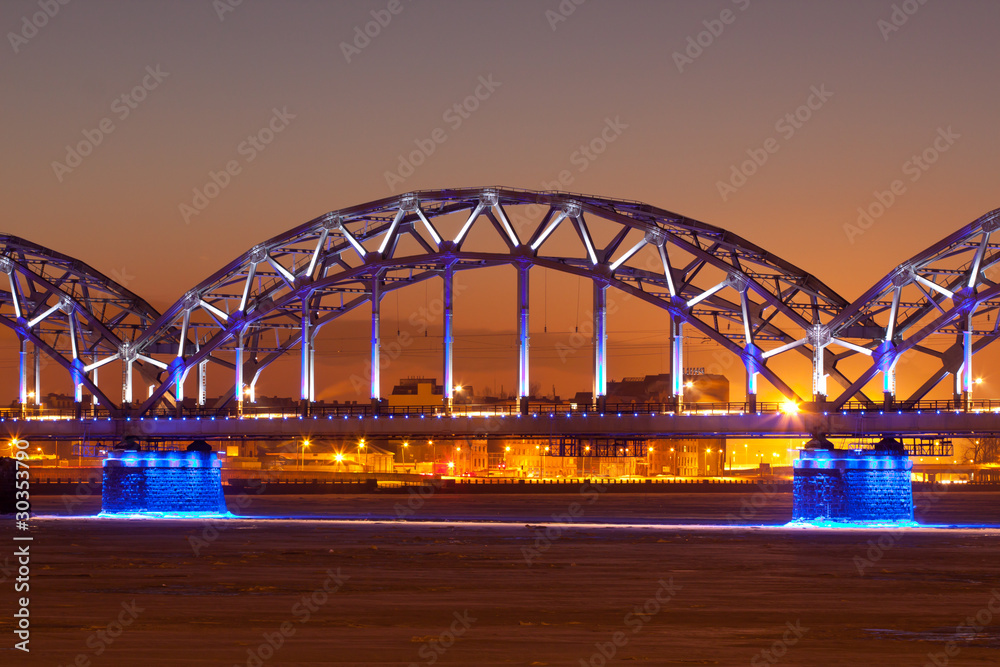 Naklejka premium Illuminated railway bridge