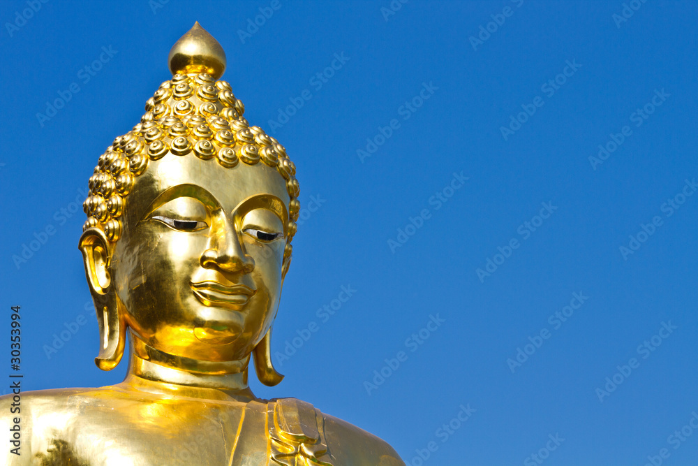 Golden Buddha under the open sky