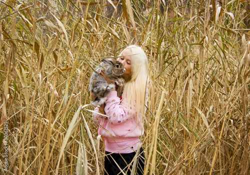 a girl and a rabbit