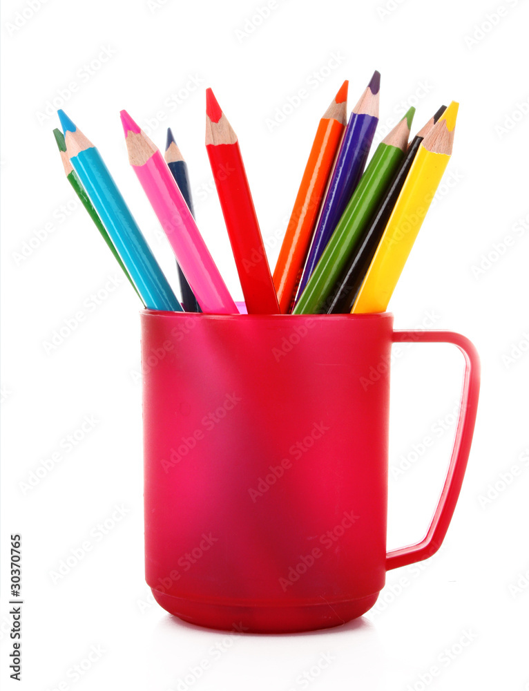Many colorful pencils in the cup  on the white background